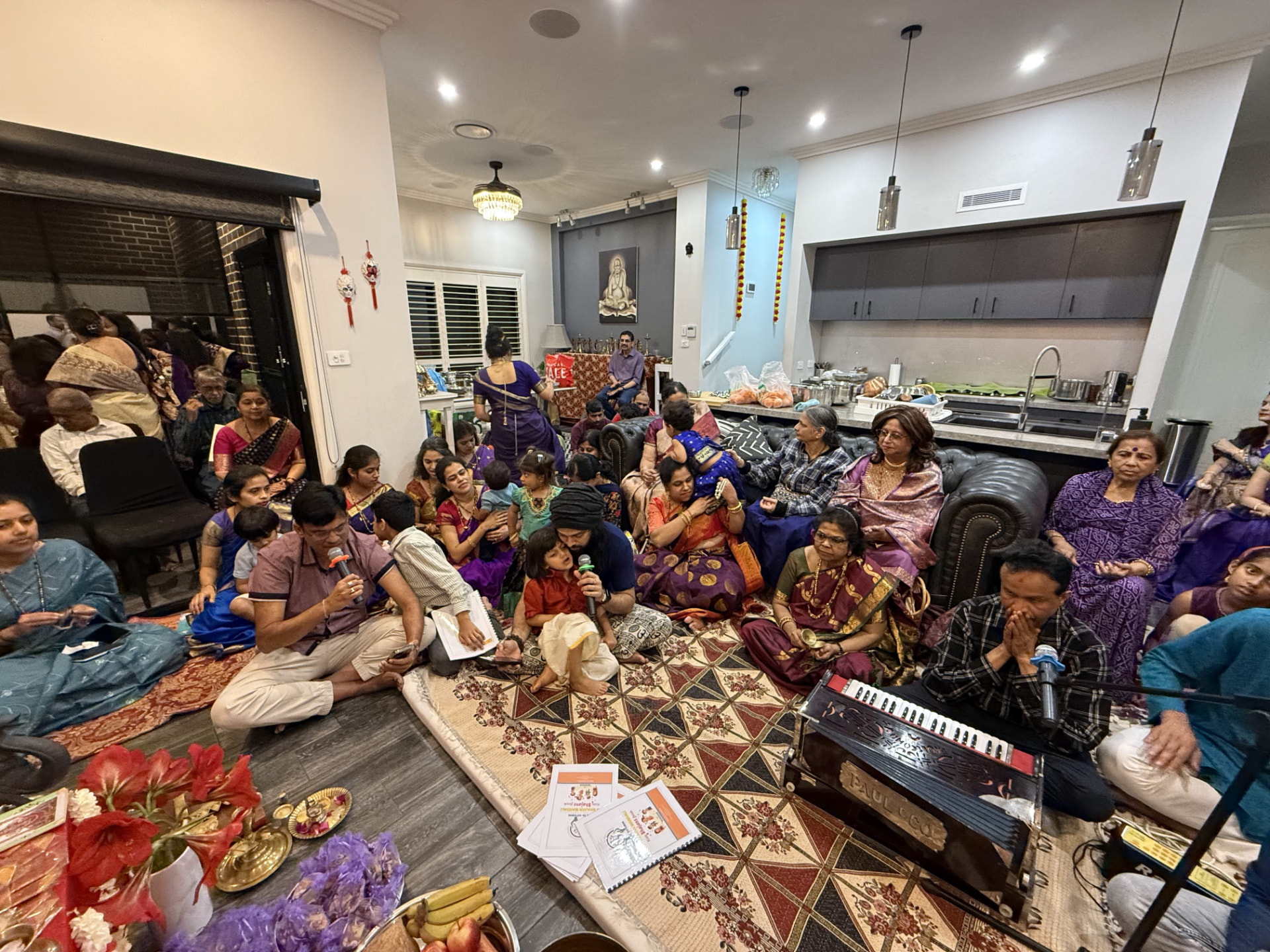 The house full for the Navratri bhajan sabha, young and old singing together