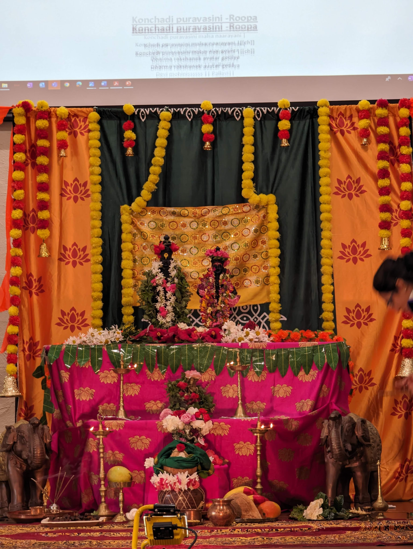 Konkani bhajan lyrics on screen as the sabha begins