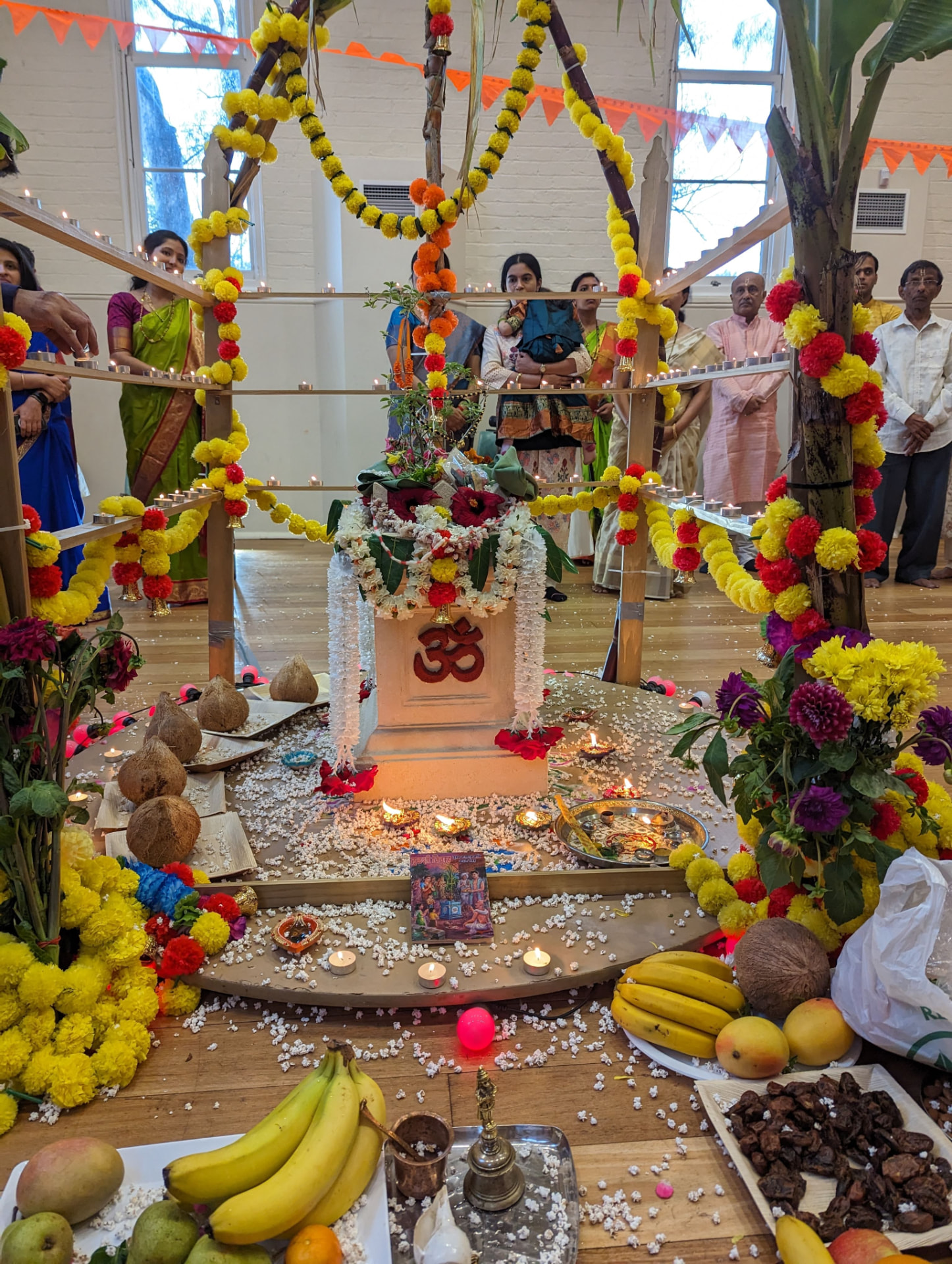 Tulsi Vivah mandap with coconuts, fruits and naivedya offerings